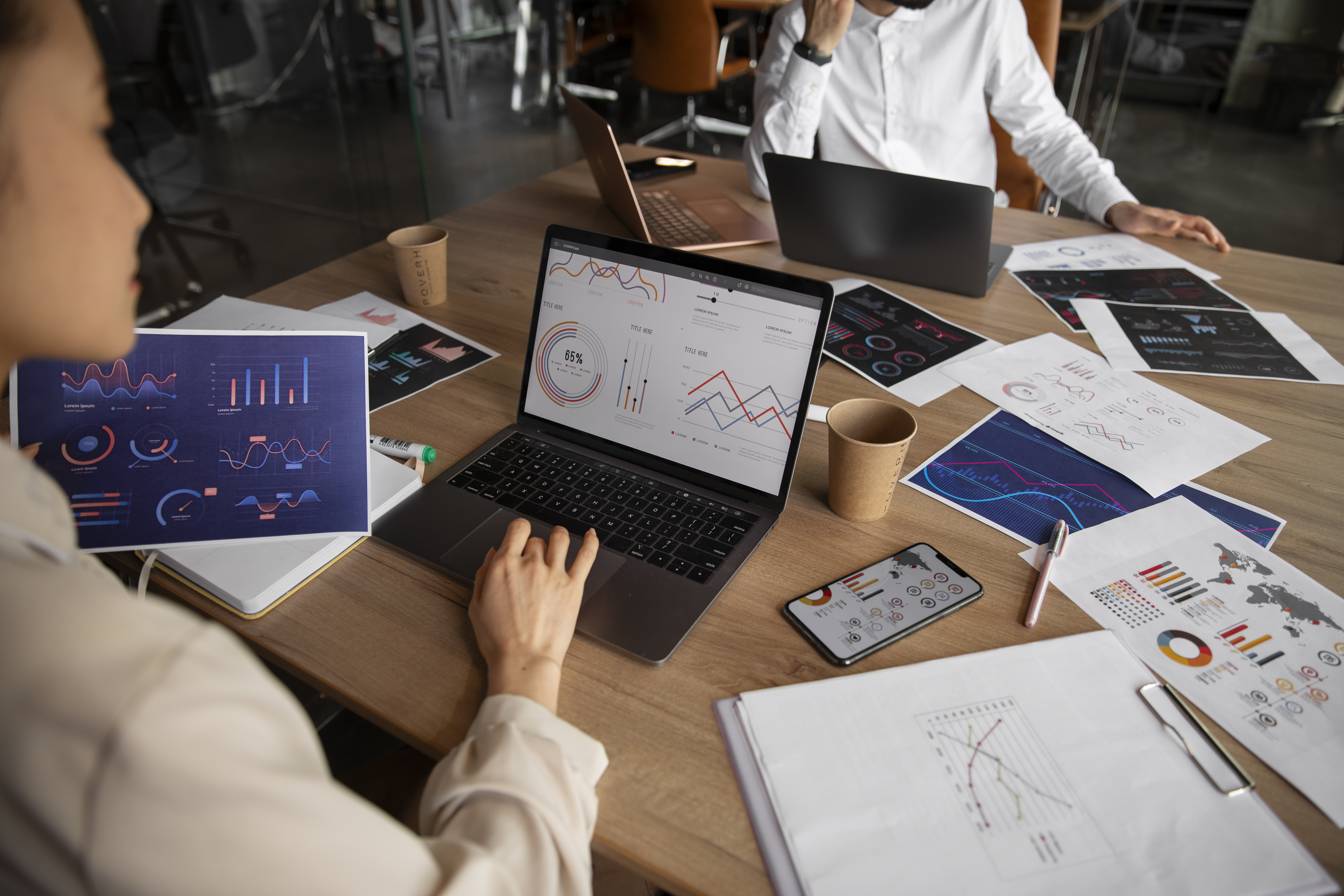 SEO tracking and reporting process with dashboards monitoring keyword rankings, traffic growth, and performance insights.