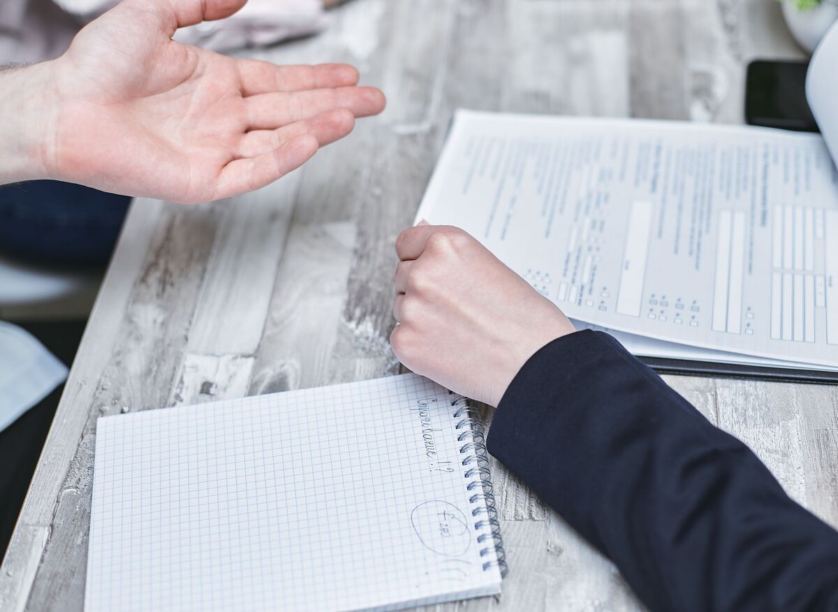 Law firm professionals reviewing immigration case preparation documents