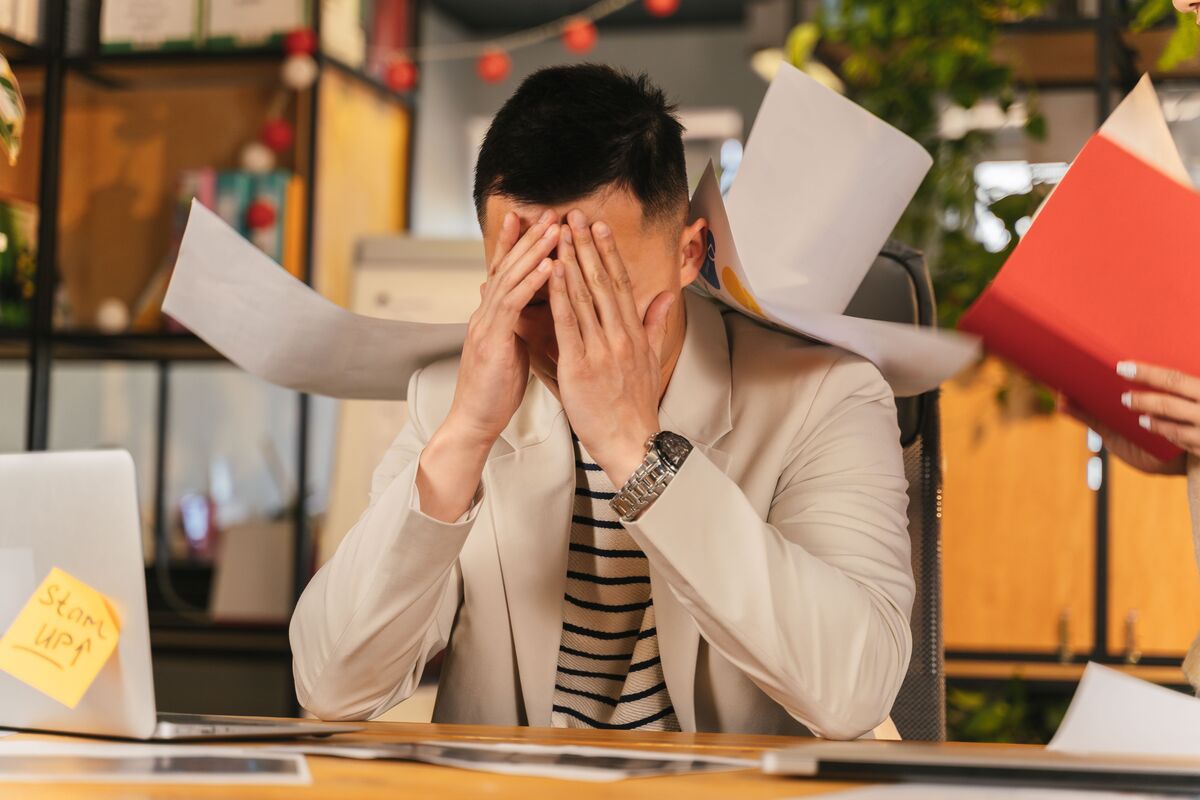 Attorney experiencing workload pressure from client messages, documents, scheduling, and administrative tasks at a busy law firm